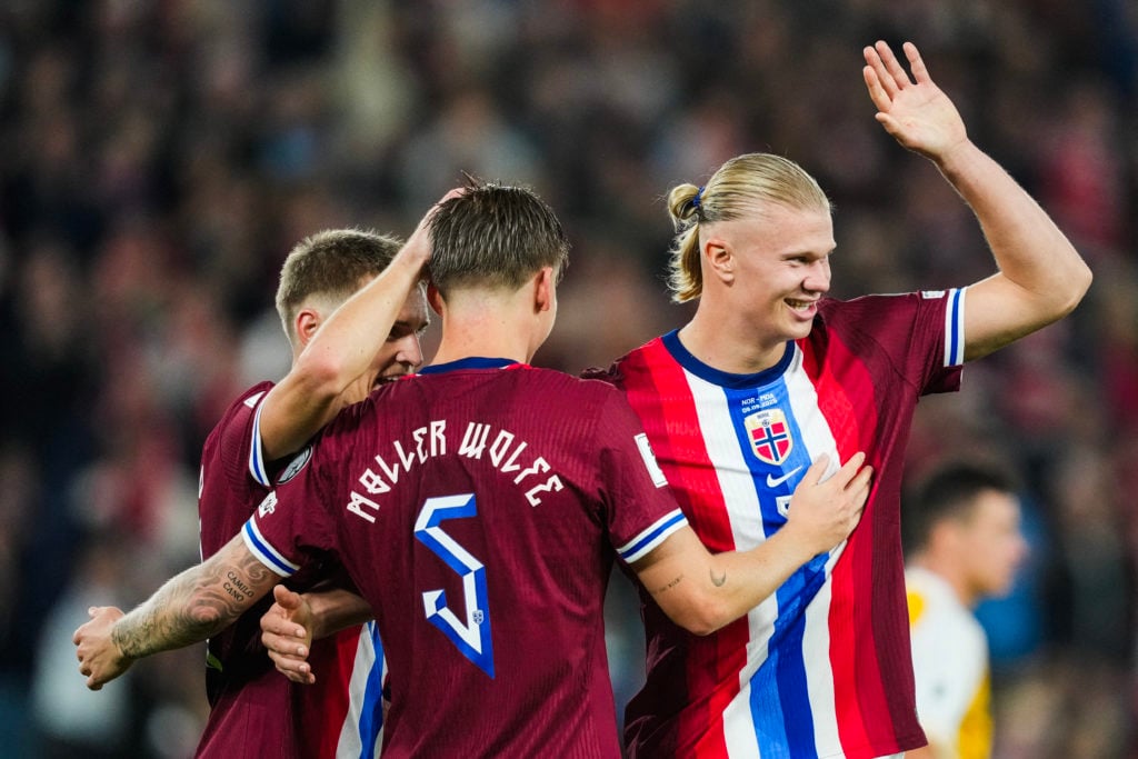 Norway's forward #09 Erling Braut Haland (R) celebrates scoring the 6-0 goal during the 2026 World Cup qualifiers Europe zone group I football match