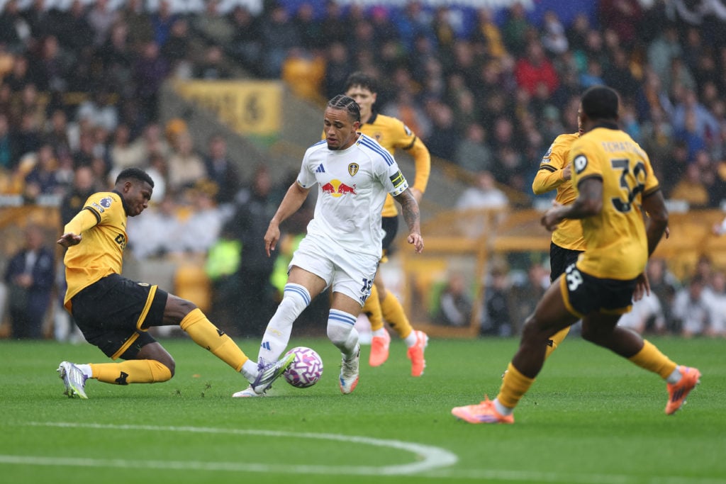 Yerson Mosquera slides in against Leeds.