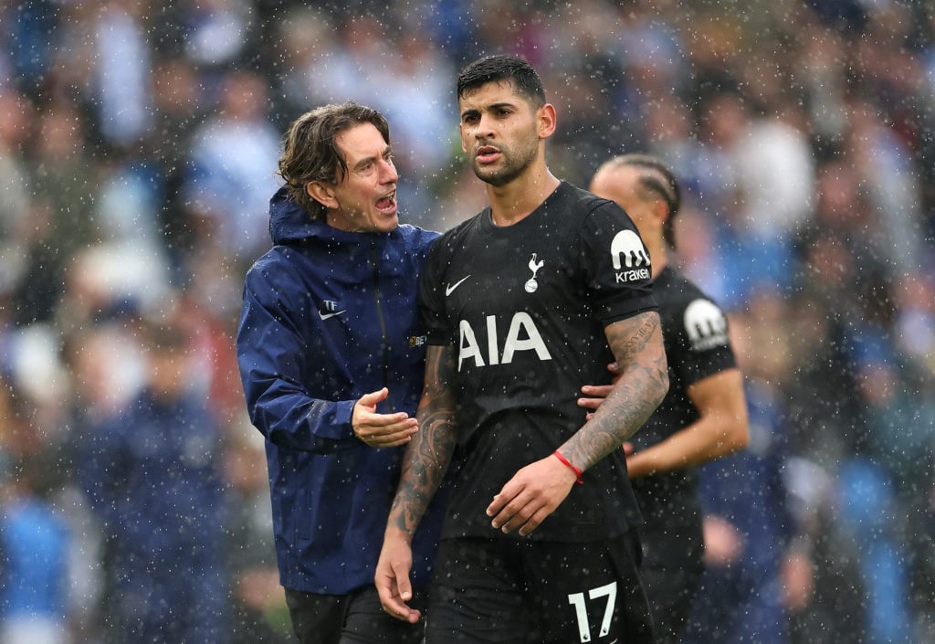 Thomas Frank and Cristian Romero interact after Tottenham drew against Brighton.
