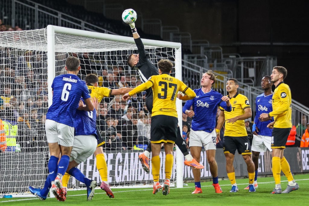Sam Johnstone tips the ball over the bar while playing for Wolves.