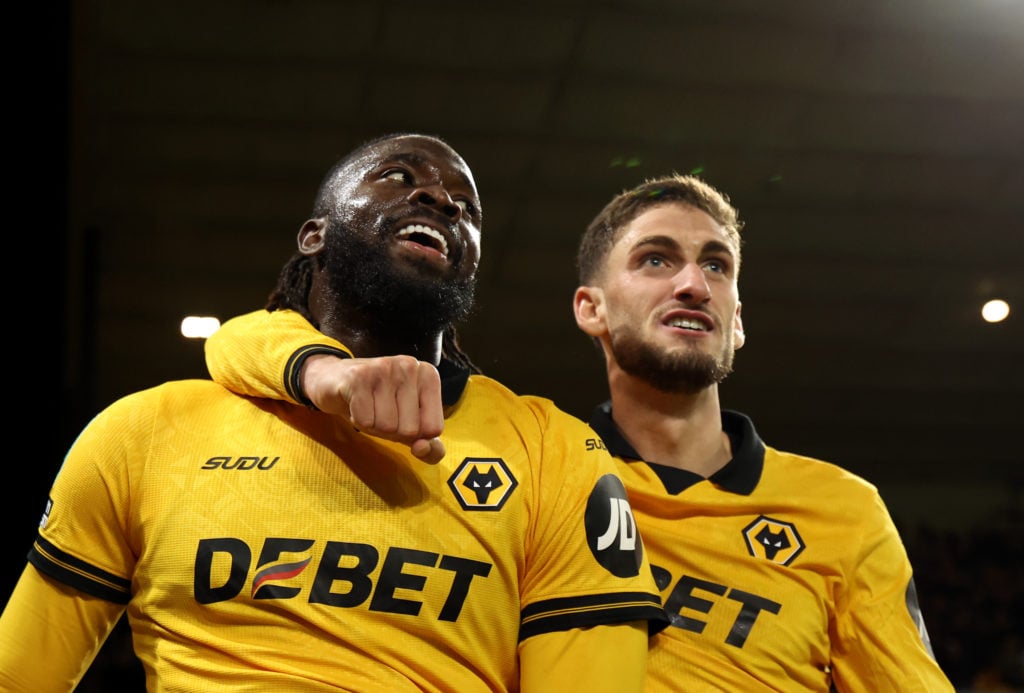 Tolu Arokodare celebrates with Santiago Bueno.
