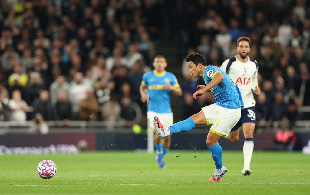 Hwang Hee-chan plays a pass for Wolves against Tottenham.