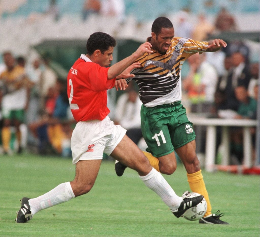 Wolves player Mark Williams of South Africa takes on Egypt's Yasser Radwan during Egypt's 1-0 victory over South Africa