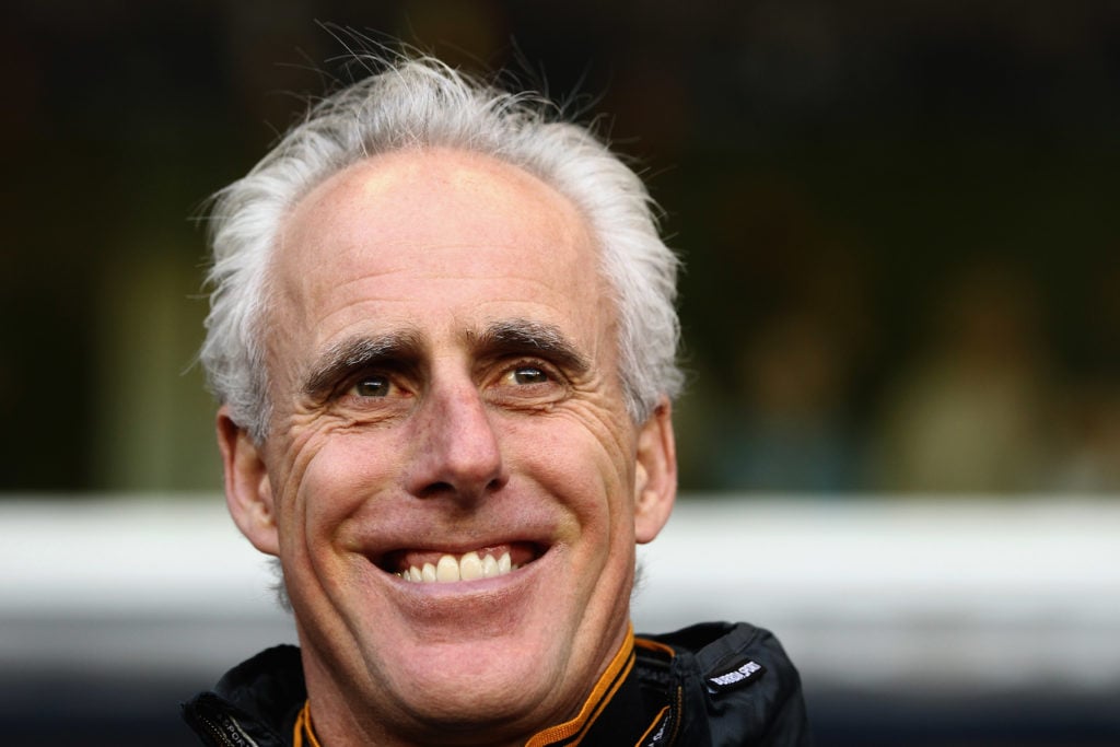 Mick McCarthy smiling ahead of Wolves playing a match