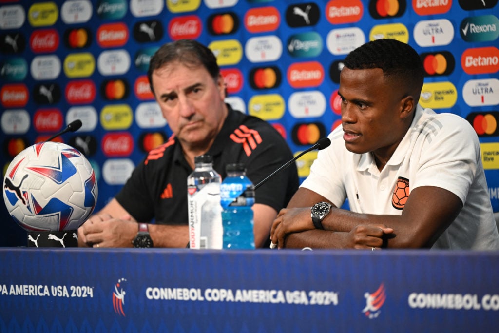 Nestor Lorenzo and Jhon Arias in a press conference before a Copa America game in 2024