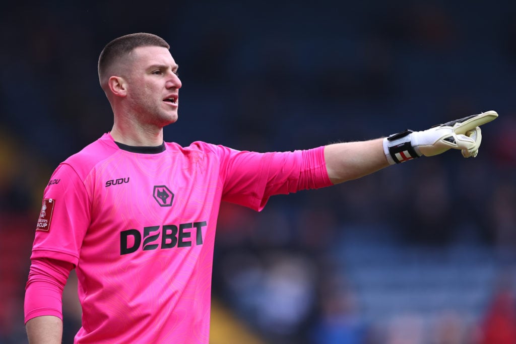 Sam Johnstone pointing while playing for Wolves.