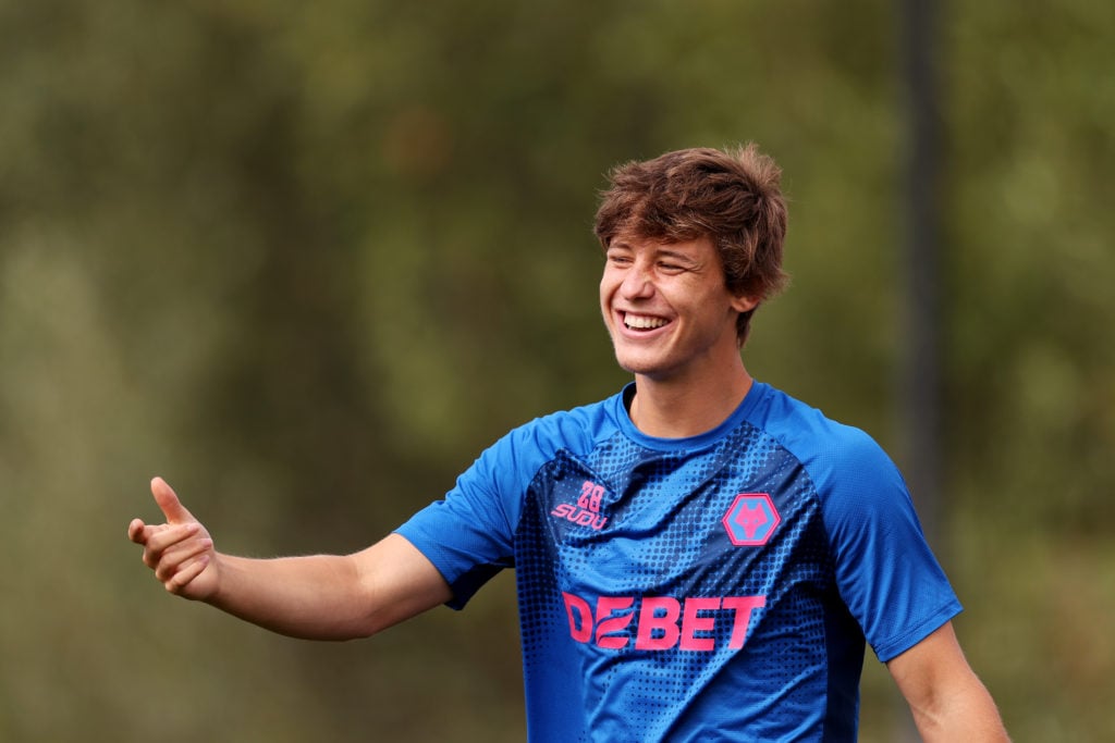 Fer Lopez smiles in Wolves training.