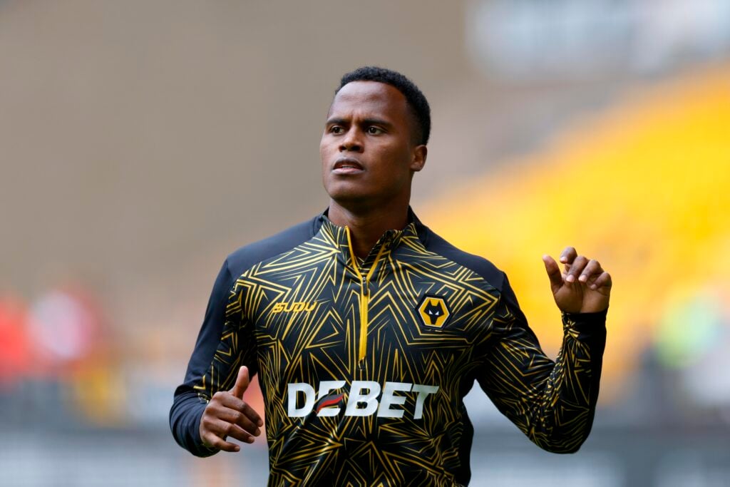 Jhon Arias warming up for Wolves.