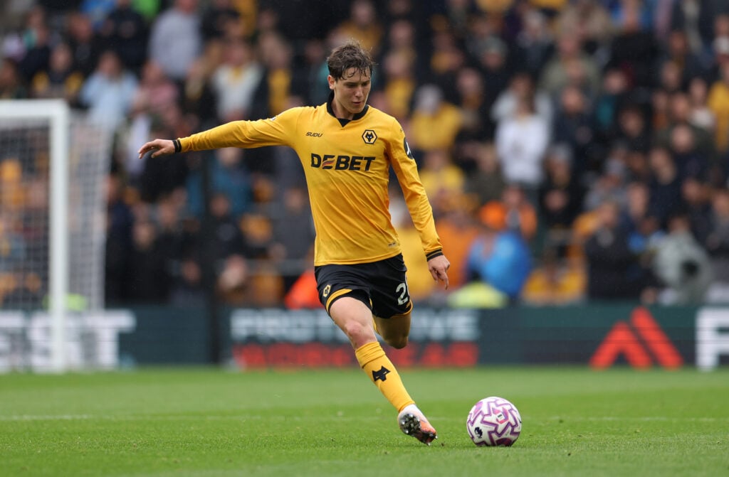 Fer Lopez plays a ball for Wolves.