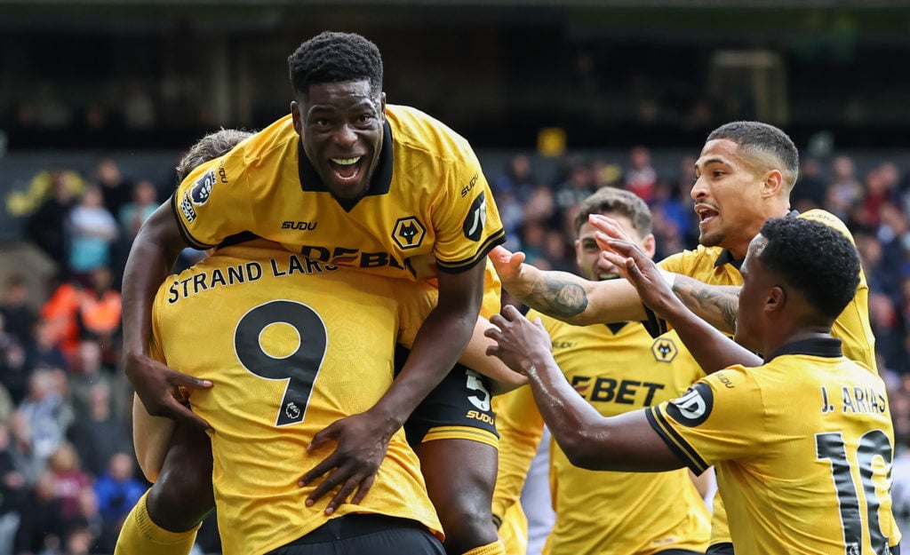olverhampton Wanderers' Marshall Munetsi celebrates the opening goal with Jorgen Strand Larsen Jhon Arias and Andre after Munetsis shot is deflected into the net