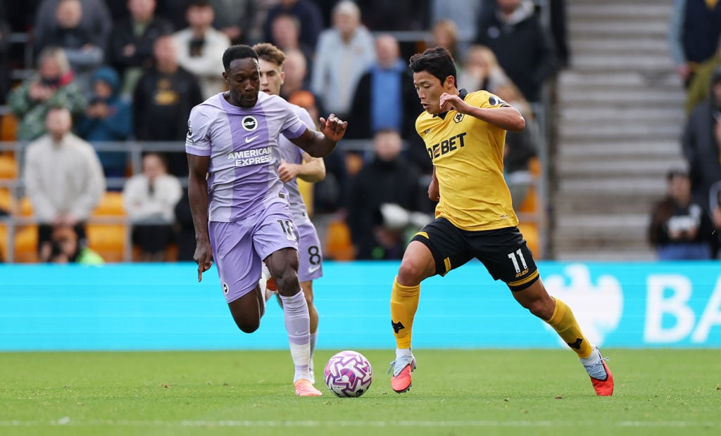 Hwang Hee-chan battling against Danny Welbeck for Wolves