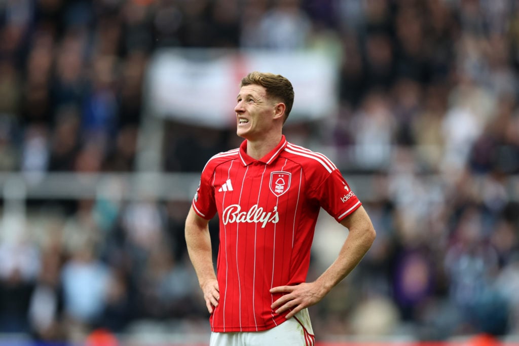 Elliot Anderson puts his hands on his hips while playing for Nottingham Forest.