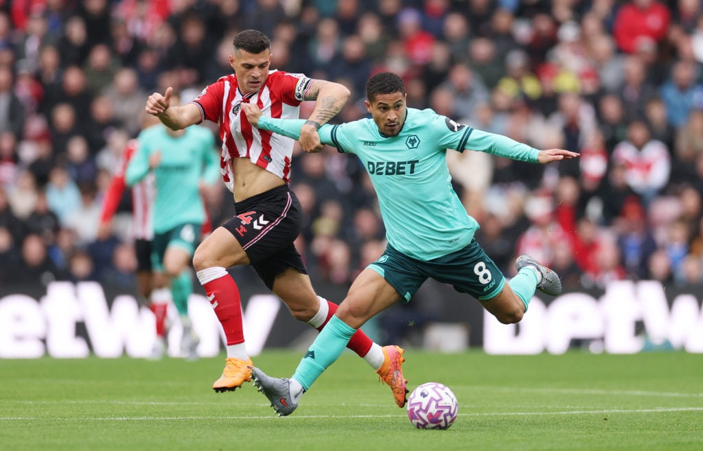 Joao Gomes on the ball for Wolves.