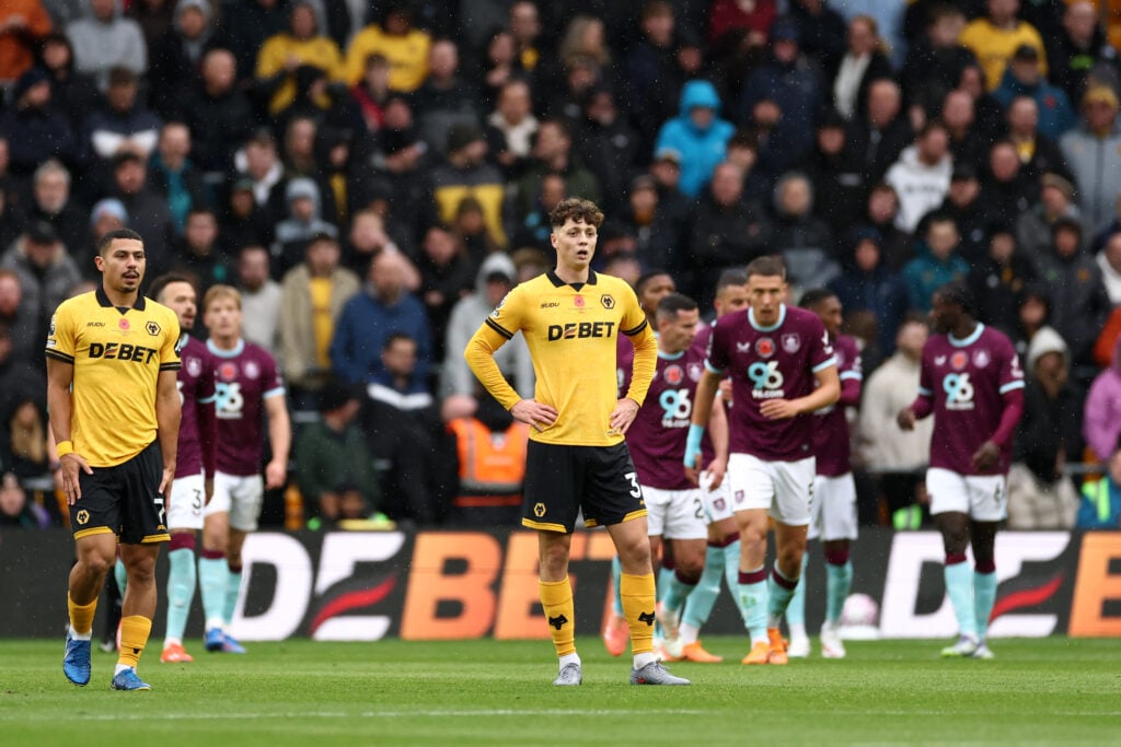 Wolves players look dejected after losing to Burnley.