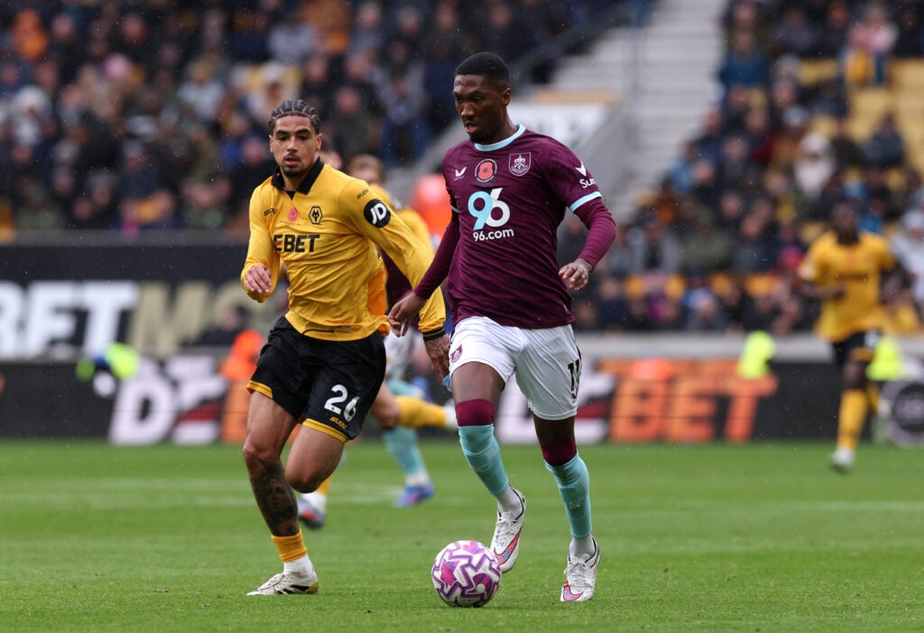 Jaidon Anthony of Burnley runs with the ball whilst under pressure from Ki-Jana Hoever of Wolves
