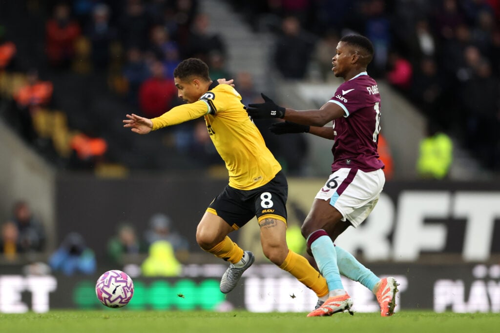 Joao Gomes fights for the ball against Burnley.