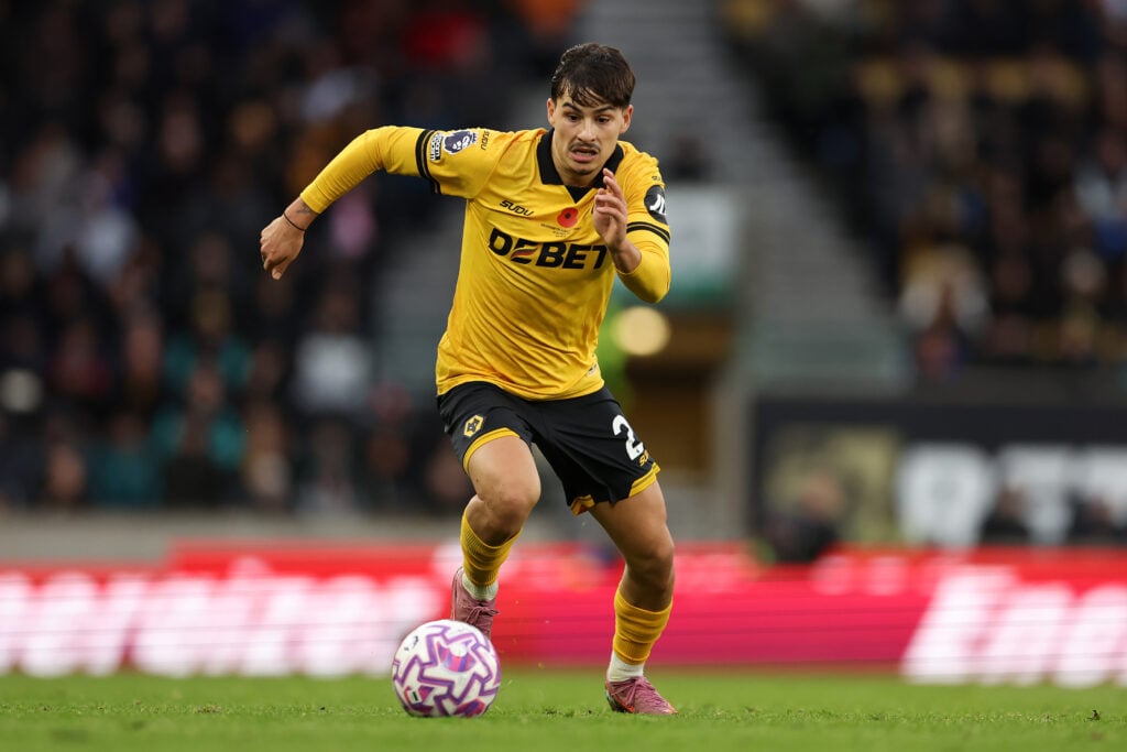 Rodrigo Gomes of Wolverhampton Wanderers runs with the ball during the Premier League match between Wolverhampton Wanderers and Burnley