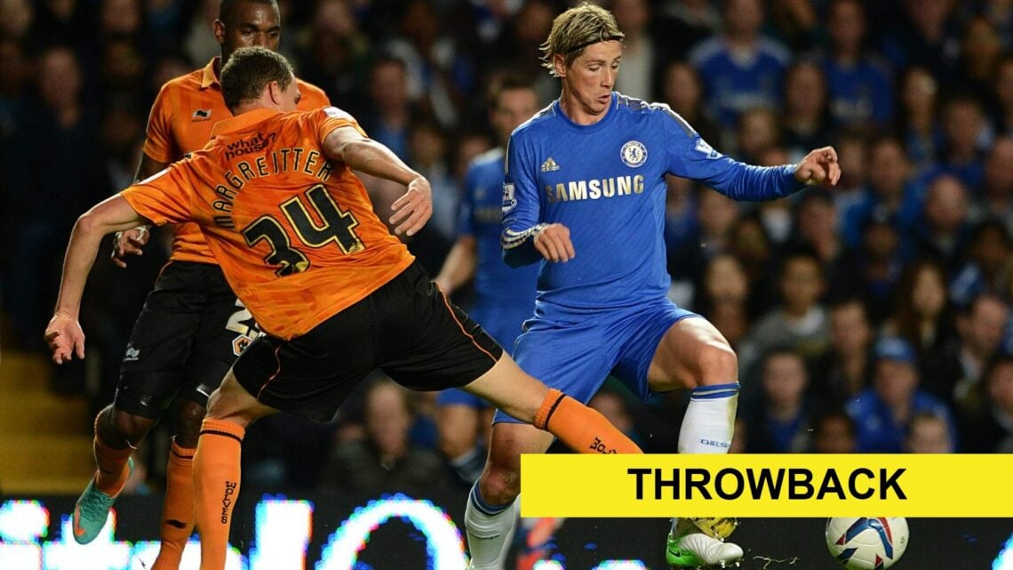Fernando Torres and Georg Margreitter fight for the ball, throwback banner (bottom right)