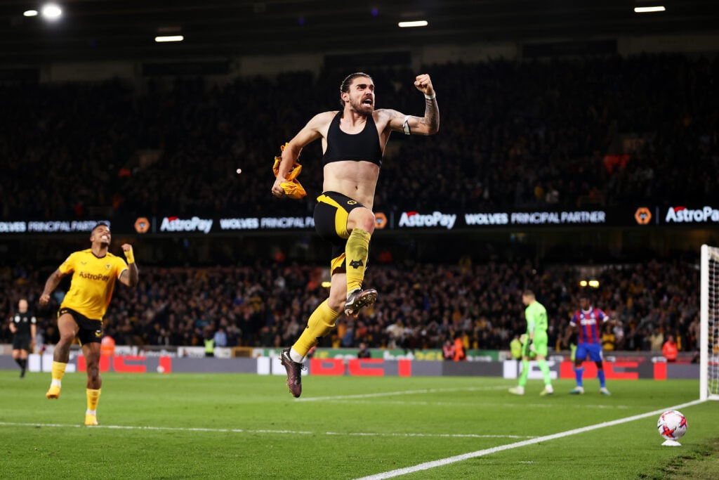 Ruben Neves jumps for joy after scoring for Wolves.