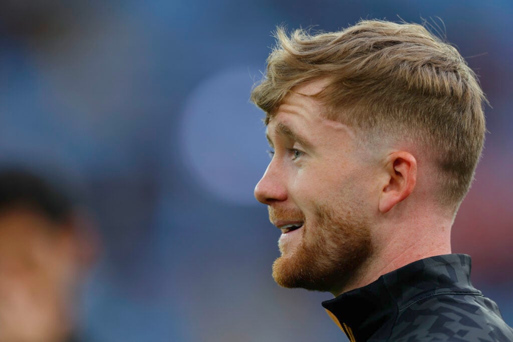 Tommy Doyle warming up for Wolves.