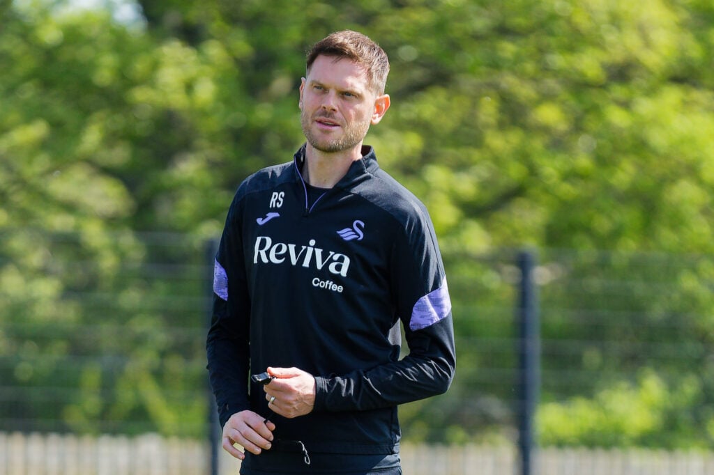 Richard Stearman observes Swansea City training