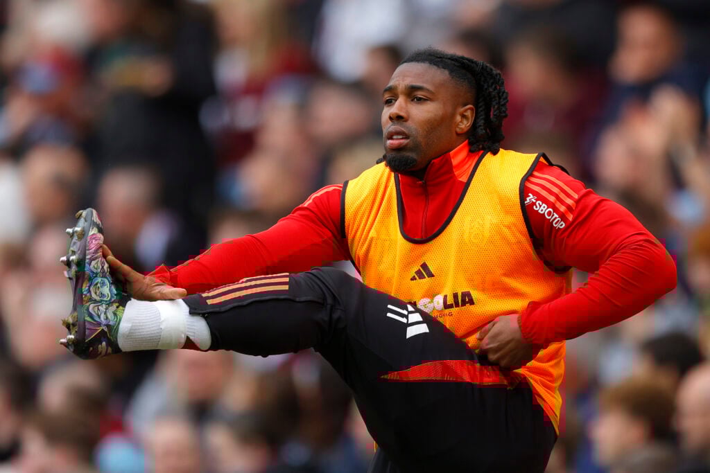 Adama Traore warms up for Fulham.
