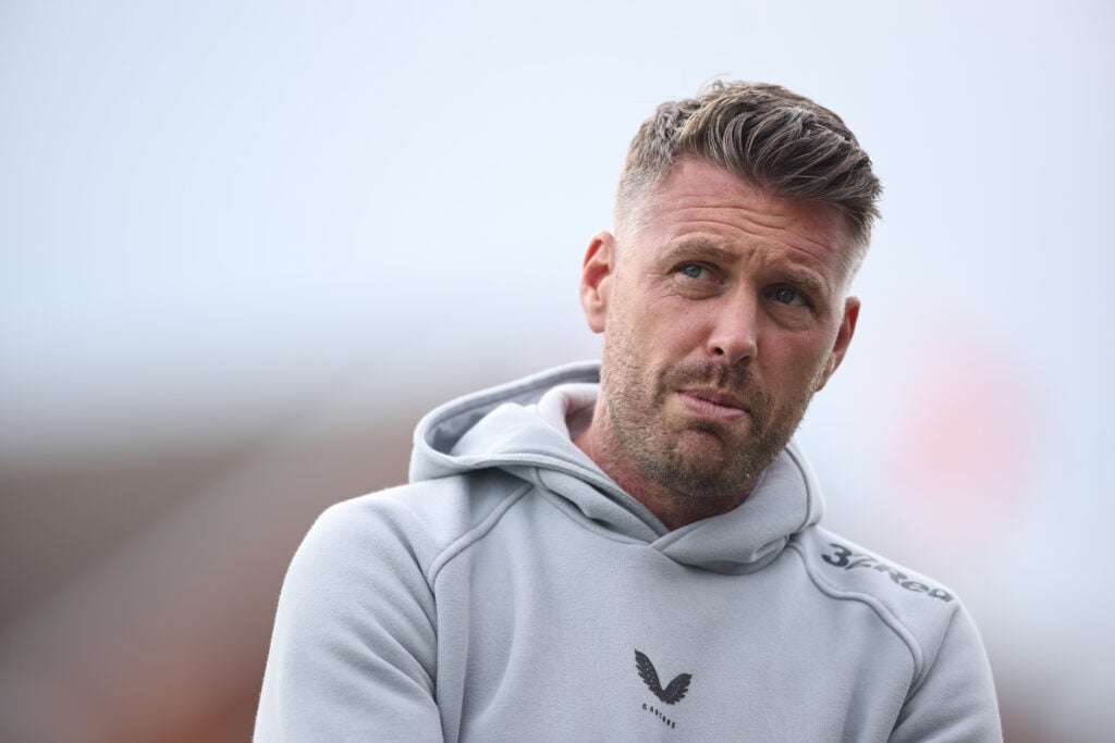 Rob Edwards look on.