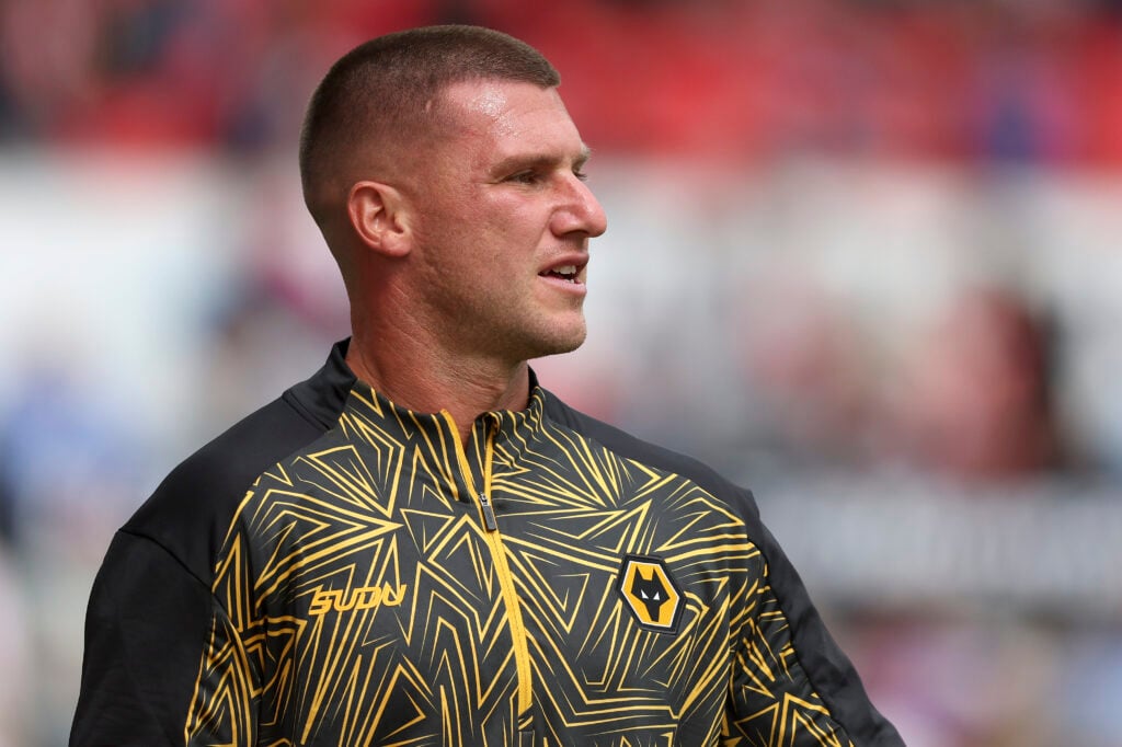 Sam Johnstone warming up for Wolves.