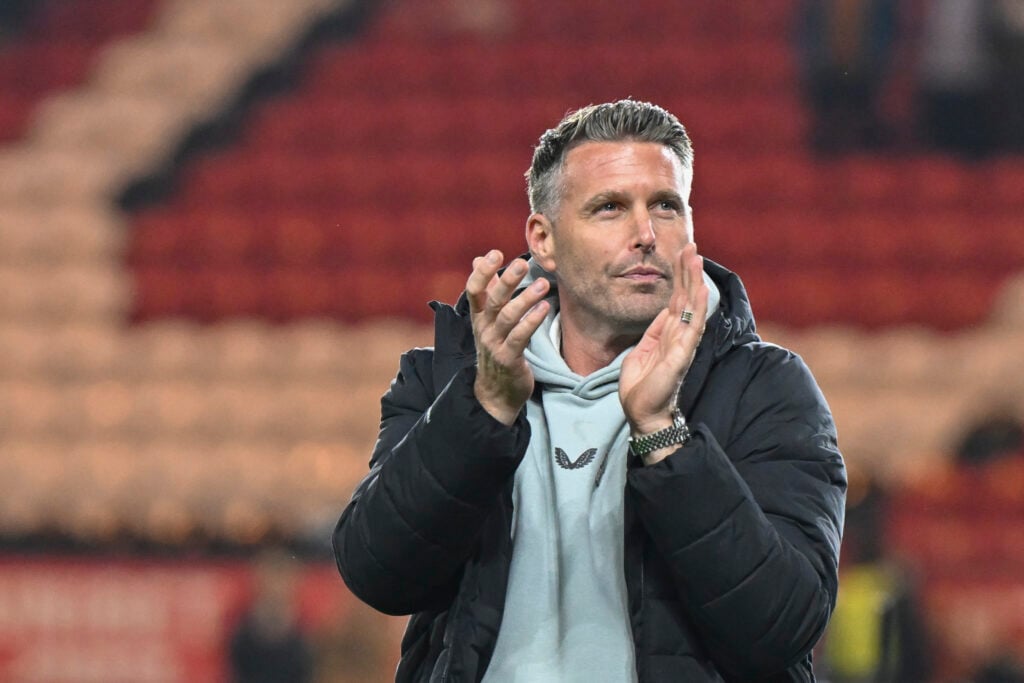 Rob Edwards claps Middlesbrough fans.