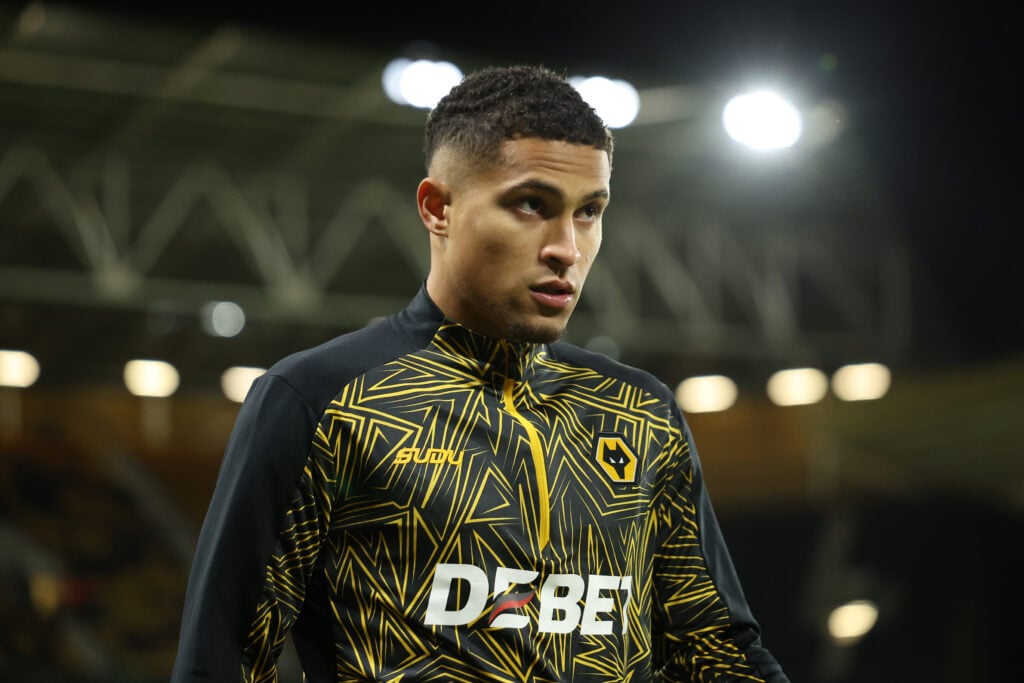 Joao Gomes warming up for Wolves.