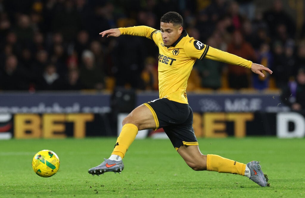 Joao Gomes stretches for the ball for Wolves.