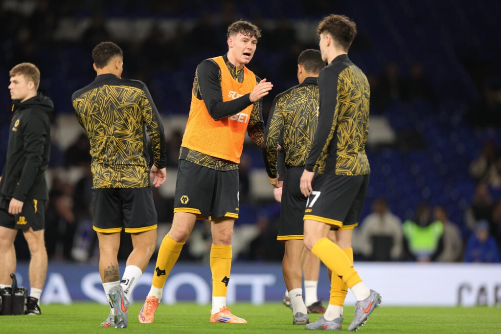 Wolves players including Jorgen Strand Larsen warm up.