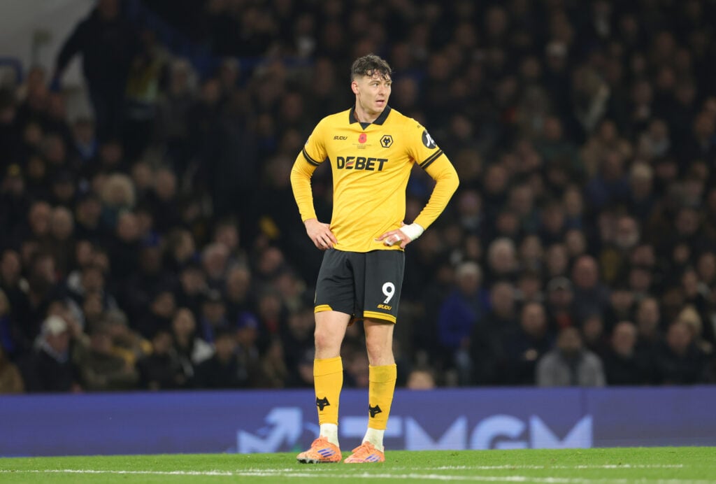 Wolves striker Jorgen Strand Larsen puts his hands on his hips.