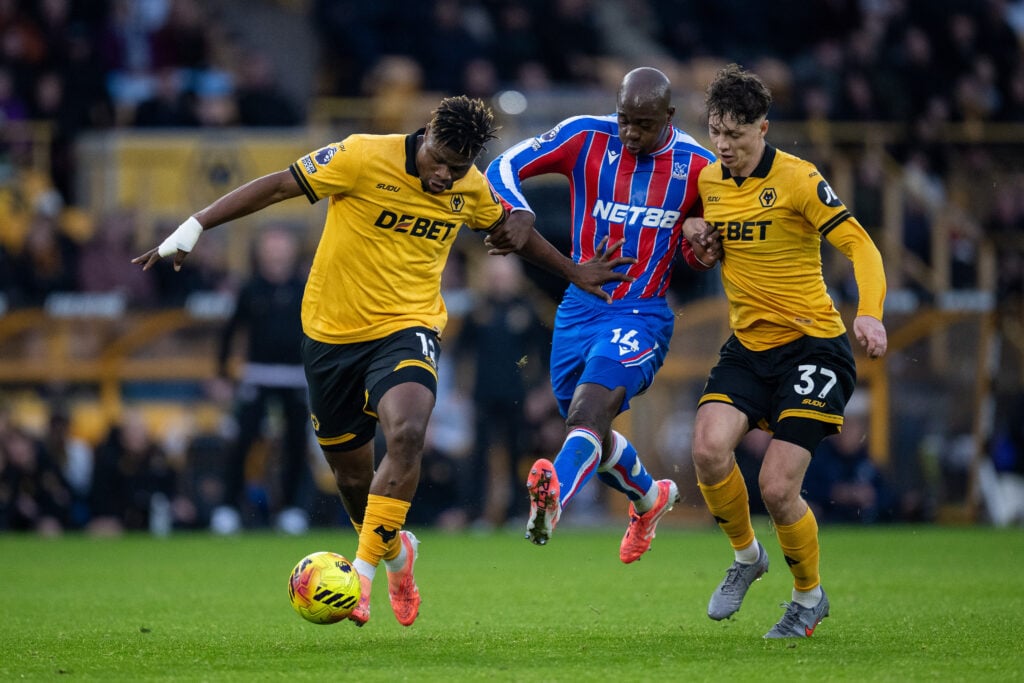 Emmanuel Agbadou protects the ball from Jean-Philippe Mateta.