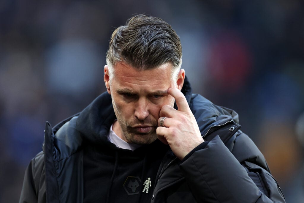 Wolves manager Rob Edwards looks ponderous.