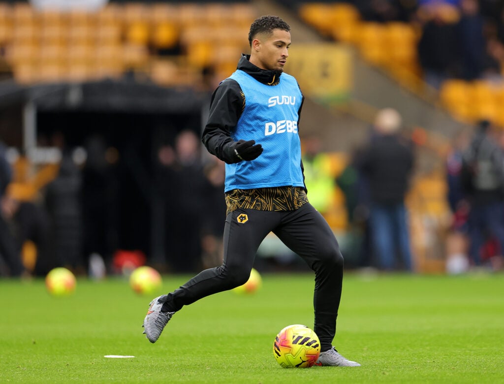 Joao Gomes warming up for Wolves.