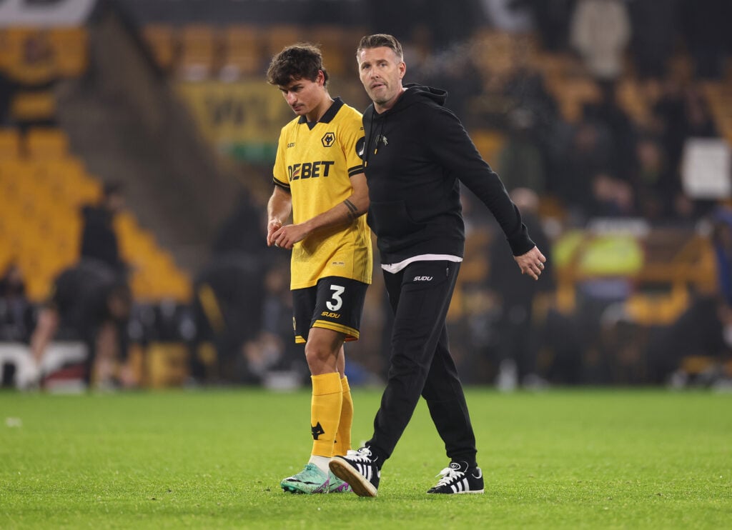 Rob Edwards looking dejected alongside Hugo Bueno