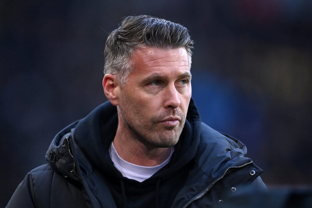 Rob Edwards looks on