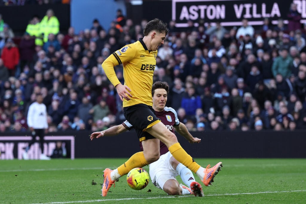 Jorgen Strand Larsen being tackled by Pau Torres