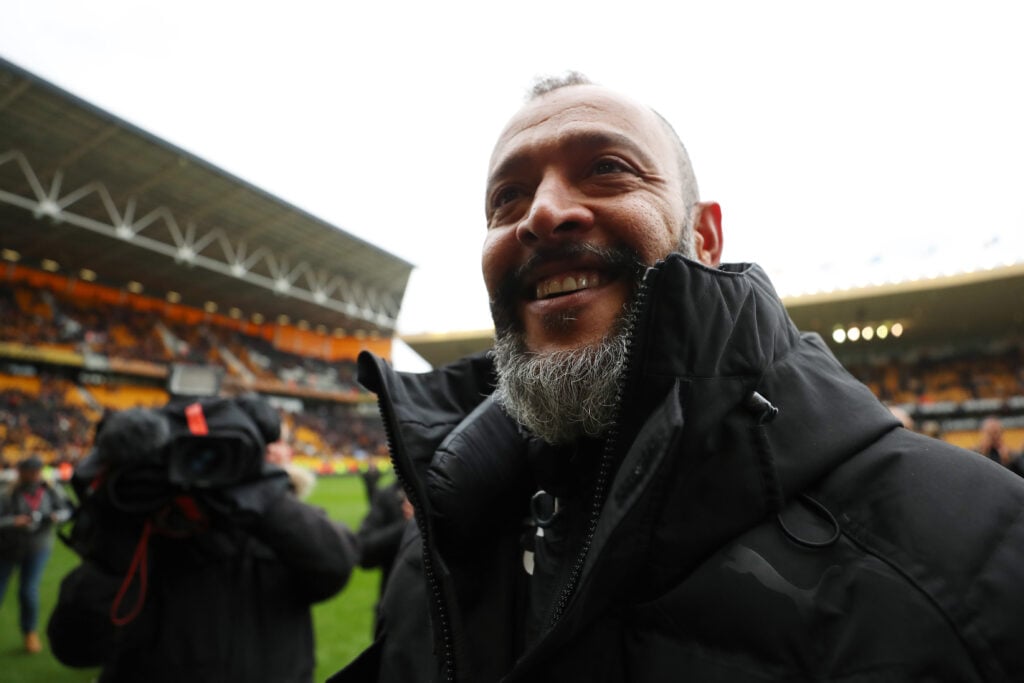 Nuno Espirito Santo, Manager of Wolverhampton Wanderers shows appreciation to the fans as he celebrates victory and his team getting promoted