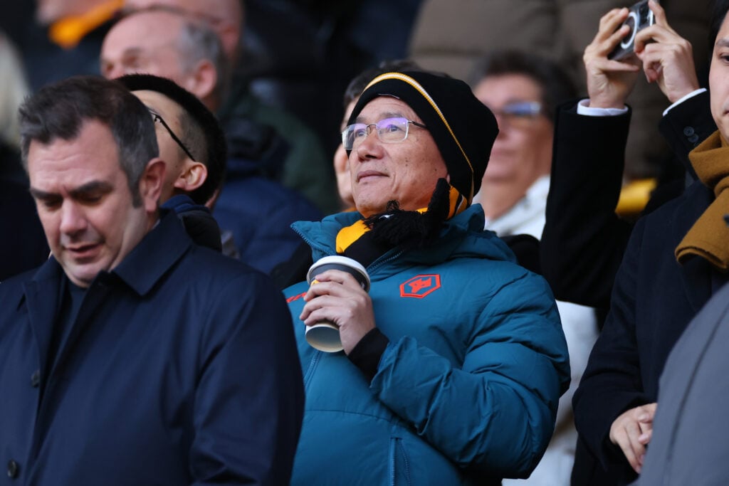 Guo Guangchang looks on at Molineux.