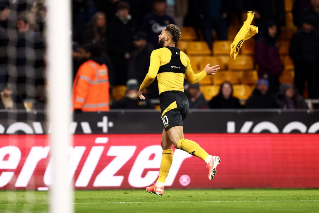 Matheus Cunha celebrates after scoring for Wolves against Aston Villa.