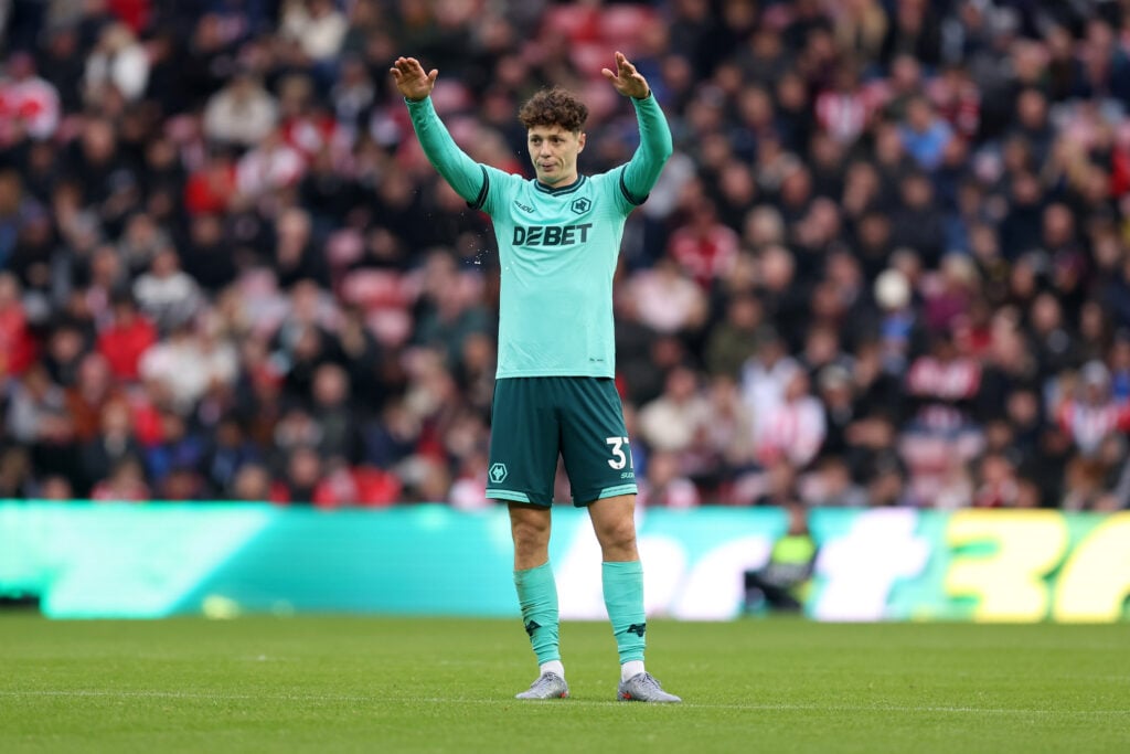 Ladislav Krejci lifts his arms for Wolves.
