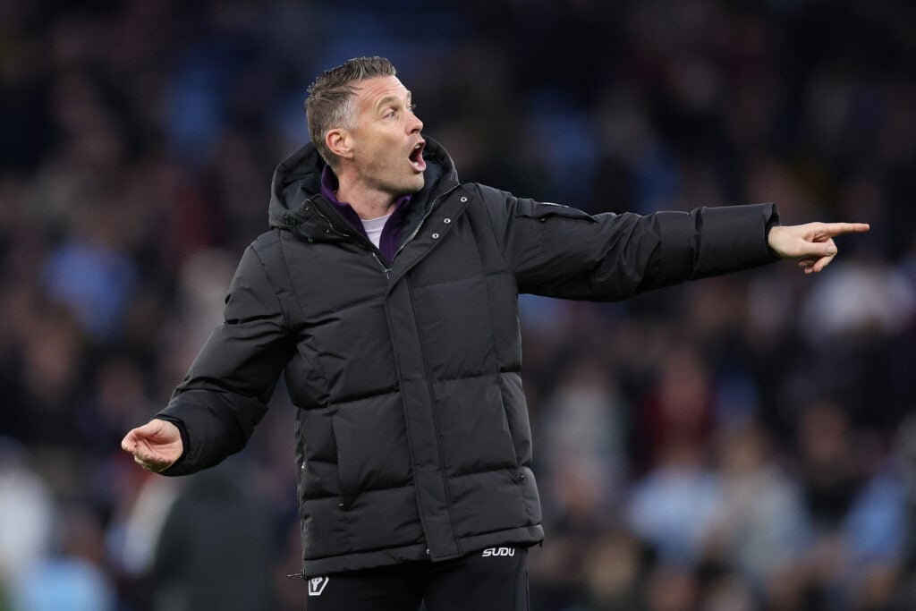 Rob Edwards gestures while managing Wolves.