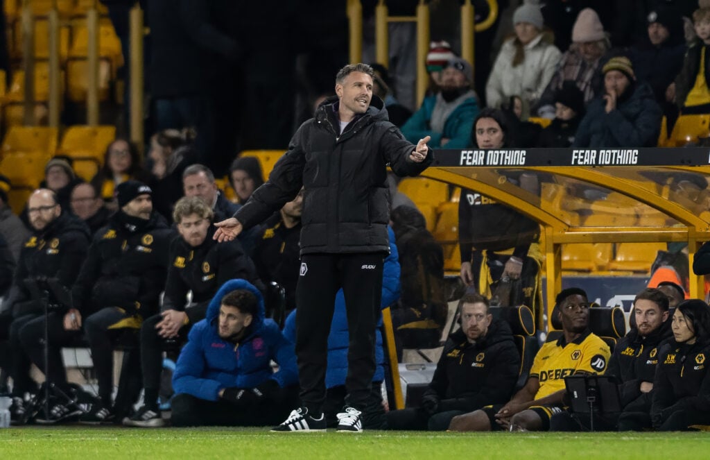 Rob Edwards looks on while managing Wolves.