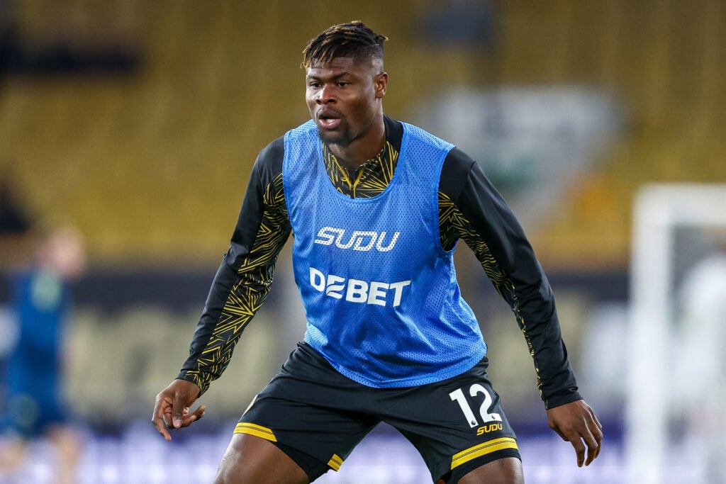 Emmanuel Agbadou warming up for Wolves.