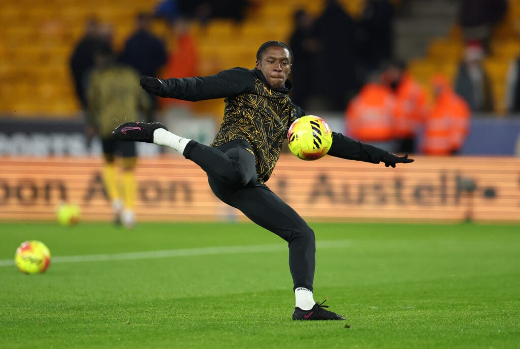 Jean-Ricner Bellegarde warms up for Wolves.