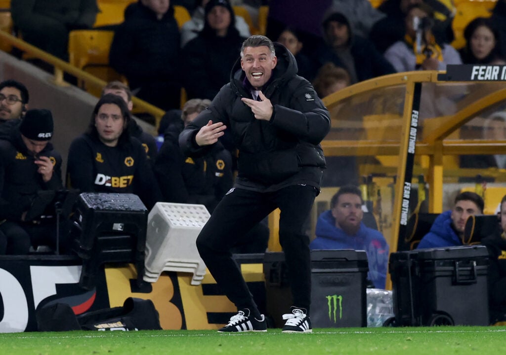 Wolves manager Rob Edwards gives instructions.