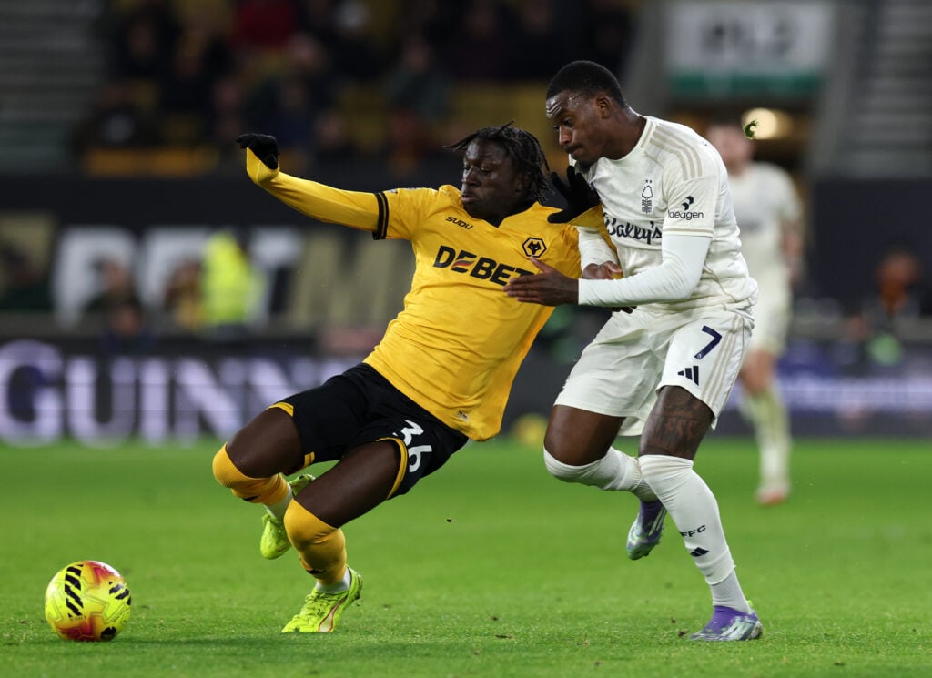 Mateus Mane of Wolverhampton Wanderers controls the ball whilst under pressure from Callum Hudson-Odoi of Nottingham Forest