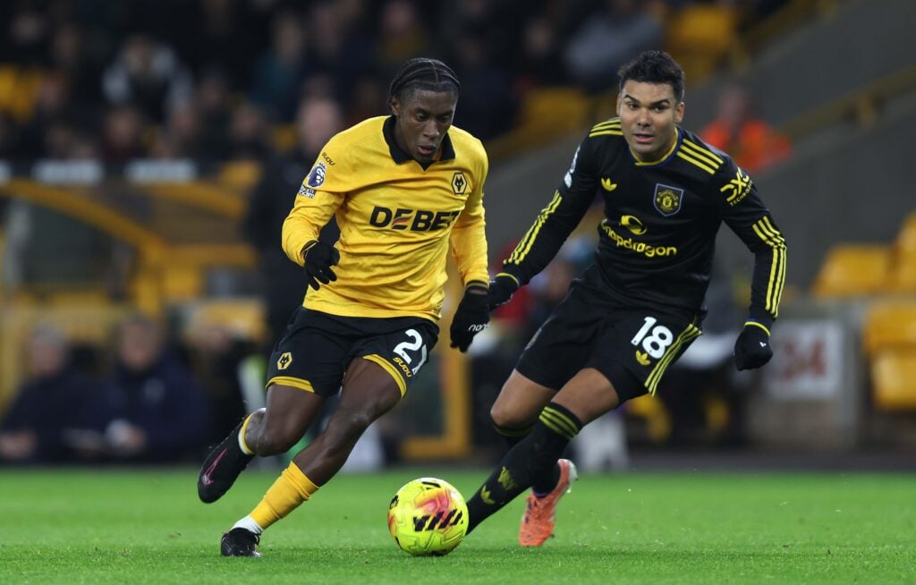 Jean-Ricner Bellegarde dribbles the ball for Wolves.